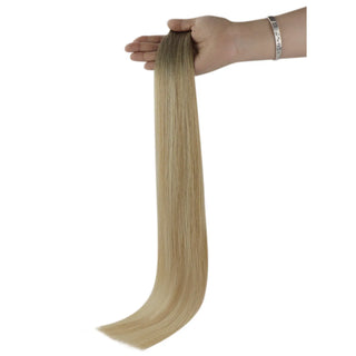 Fullshine virgin hair blonde lowlights provide a soft, dimensional finish.