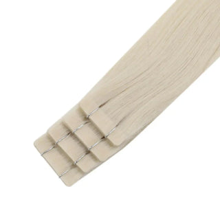 Virgin bleach blonde hair extensions with soft texture and shine.