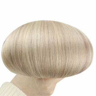 Natural blonde lowlights upgraded with dimensional rose brown accents.