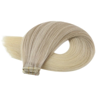 Virgin blonde extensions naturally enhanced with rose brown lowlights for added richness.