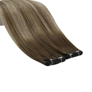 Virgin balayage brown and blonde Fullshine extensions creating natural dimension and movement.