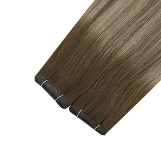Fullshine multi-tonal brown balayage with blonde highlights offering smooth invisible weft coverage.