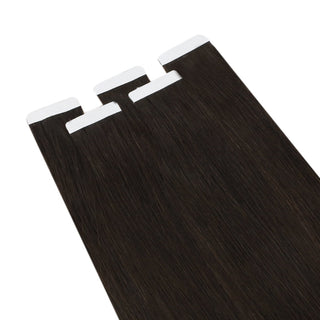 Dark brown tape in virgin hair extensions from Full Shine provide salon-quality results with a smooth natural finish.