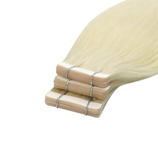 Full Shine real human hair tape extensions in light blonde offer soft texture and a natural-looking appearance.