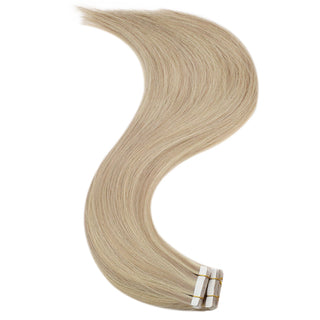 Full Shine virgin tape hair extensions with blonde highlights and lowlights blend smoothly with natural hair.