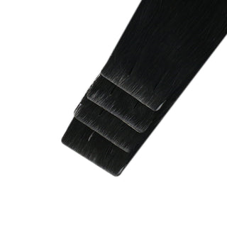 Full Shine black injection tape hair extensions featuring a seamless blend and soft natural movement after installation.