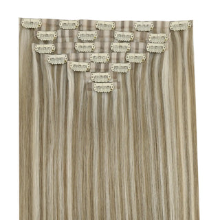 Full shine Blonde Highlights clip in real hair extensions blend perfectly with sleek hair.