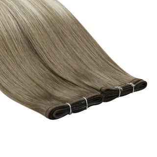 Fullshine ombre hair blending ash brown richness into smooth blonde tones.