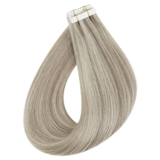 Multi-tone blonde lowlights by Fullshine enhance shine and color depth.