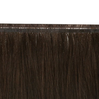Dark brown invisible and flat silk wefts creating full, natural hair results.