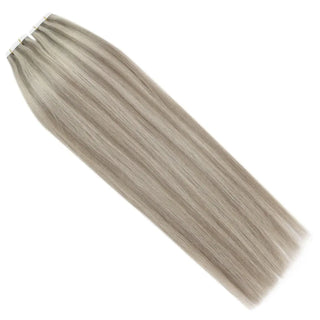 Seamless blonde lowlights tape ins from Fullshine offer natural highlight-lowlight balance.