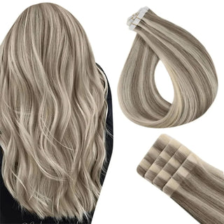 Fullshine blonde tape ins with ash gray lowlights offering a cool-toned dimensional blend.