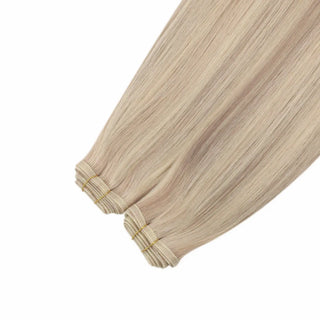 Blended blonde base with rose brown highlights for subtle contrast and richness.