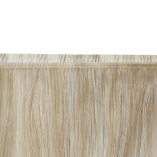Lightweight flat silk weft offering blended blonde and rose brown tones.
