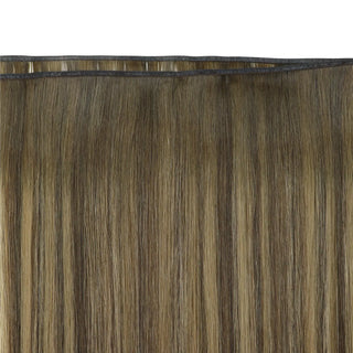 Natural-looking brown-to-blonde Fullshine balayage creating soft transitions.