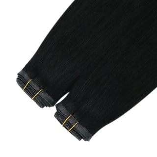 Virgin jet black Fullshine invisible weft extensions offering a flawless natural look.