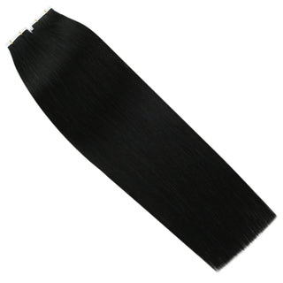 Jet black virgin hair tape in extensions blend seamlessly with dark natural hair for added volume and length.