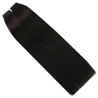 Natural black virgin hair tape ins from Full Shine blend naturally with dark hair while adding length and fullness.