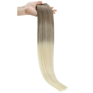Ash-to-blonde ombre virgin hair offering a radiant and modern color transition.