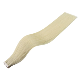 Professional Full Shine light blonde tape in hair extensions are crafted with virgin hair for customized volume and length.