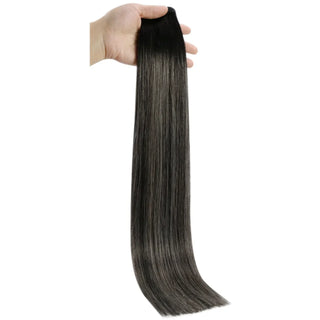 Lightweight flat silk wefts blending black base with blonde streak accents.