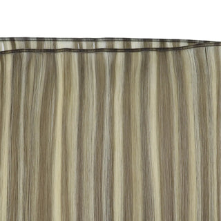 Virgin ash brown hair with blonde highlights designed in an invisible weft for seamless wear.