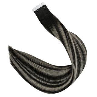 Virgin hair tape in extensions from Full Shine with black highlights provide a subtle dimensional hair effect.