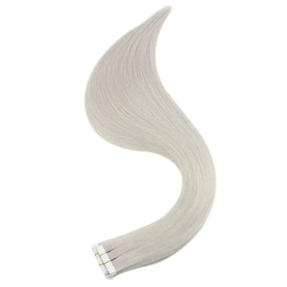 Light platinum blonde extensions blending naturally.