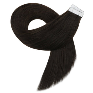 Full Shine virgin human hair tape ins in dark brown create natural-looking volume with a soft luxurious texture.