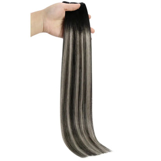 Full Shine black and silver highlighted virgin weft hair extensions, tangle-free Brazilian human hair for natural and dimensional sew-in look.