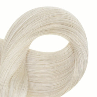 Style your bleach blonde U Tip Hair Extensions effortlessly with 100% Remy human hair, offering flexibility for curling, straightening, and more.