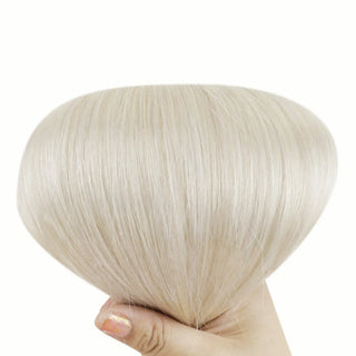 Achieve a sleek, sophisticated look with bleach blonde U Tip Hair Extensions, offering a seamless, no-heat application for maximum comfort and style.