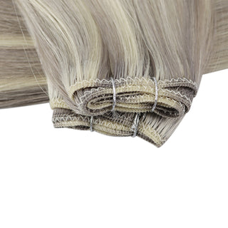 Full Shine blonde lowlights dimensional virgin weft hair extensions, smooth Brazilian human hair for natural salon results.