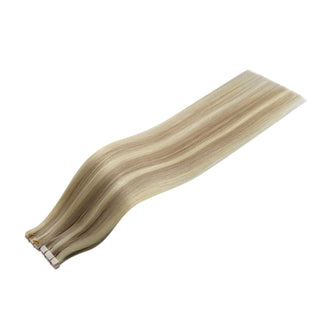 Full Shine blonde lowlights injection tape hair extensions featuring a seamless blend and natural movement after installation.