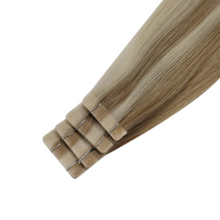 Full Shine blonde lowlights ombre injection tape hair extensions featuring a smooth color transition and comfortable tape application.