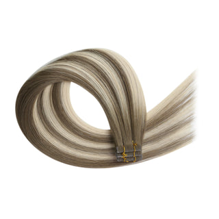 Full Shine cool brown to blonde injection tape in hair extensions deliver natural color matching, length, and volume.