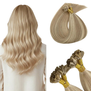 Achieve an invisible and comfortable look with dark blonde and blonde highlights in U Tip Hair Extensions, blending perfectly with your natural hair.