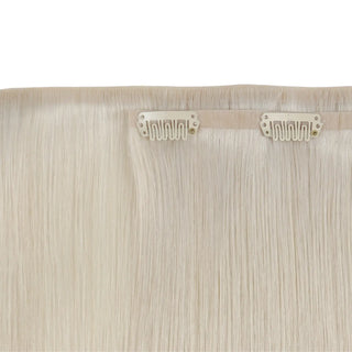 FullShine blonde clip in extensions provide a natural volume boost, blending invisibly for a flawless look.