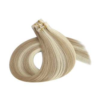 Full Shine blonde lowlights tape in hair extensions with injection technology, made from virgin hair for smooth styling results.