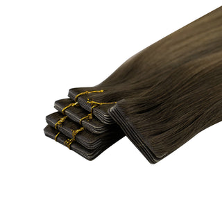 Full Shine brown balayage injection tape hair extensions with an invisible tape design for a flat and natural appearance.