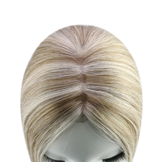Full Shine chunky highlights small base topper creating a natural-looking hairstyle with added fullness.