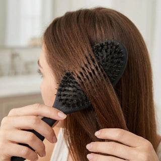 Full Shine professional detangling hair brush combines flexible bristles and an air cushion base for comfortable styling.
