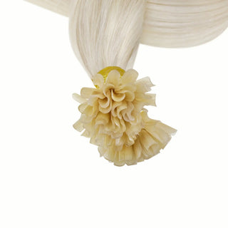 Install bleach blonde U Tip Extensions easily for a professional, salon-quality look that lasts for weeks without the need for heat or glue.