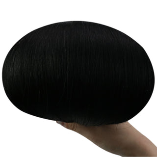 Full Shine deep black virgin weft hair extensions, luxury Brazilian human hair for elegant salon finish.