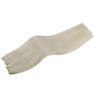 Full Shine platinum blonde dimensional virgin weft hair extensions, silky Brazilian human hair for natural salon results.